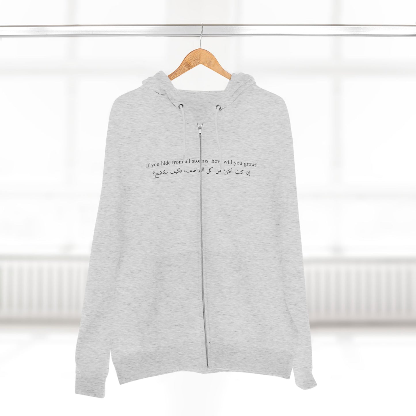 unisex zip hoodie - 'if you hide from a storm' quote